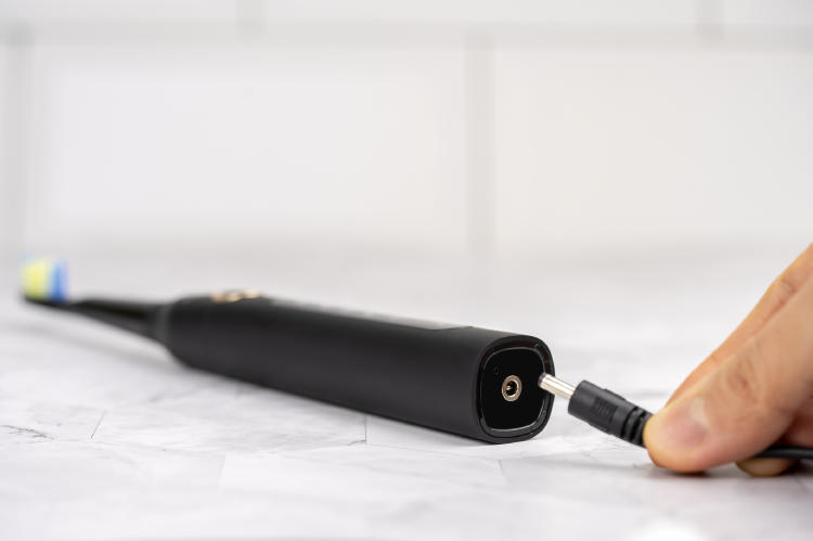 Cargando cepillo eléctrico Cargando cepillo eléctrico